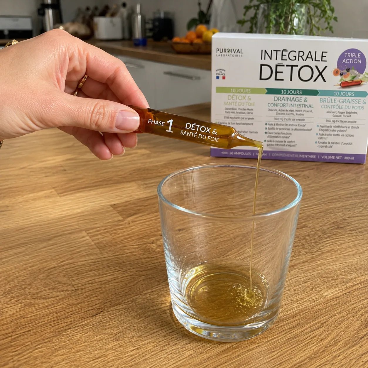 Une dose de Bioom dans un verre d'eau